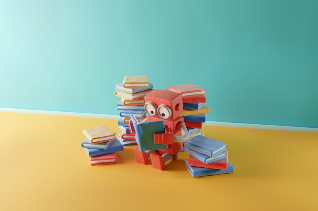 Clay robot reading a book